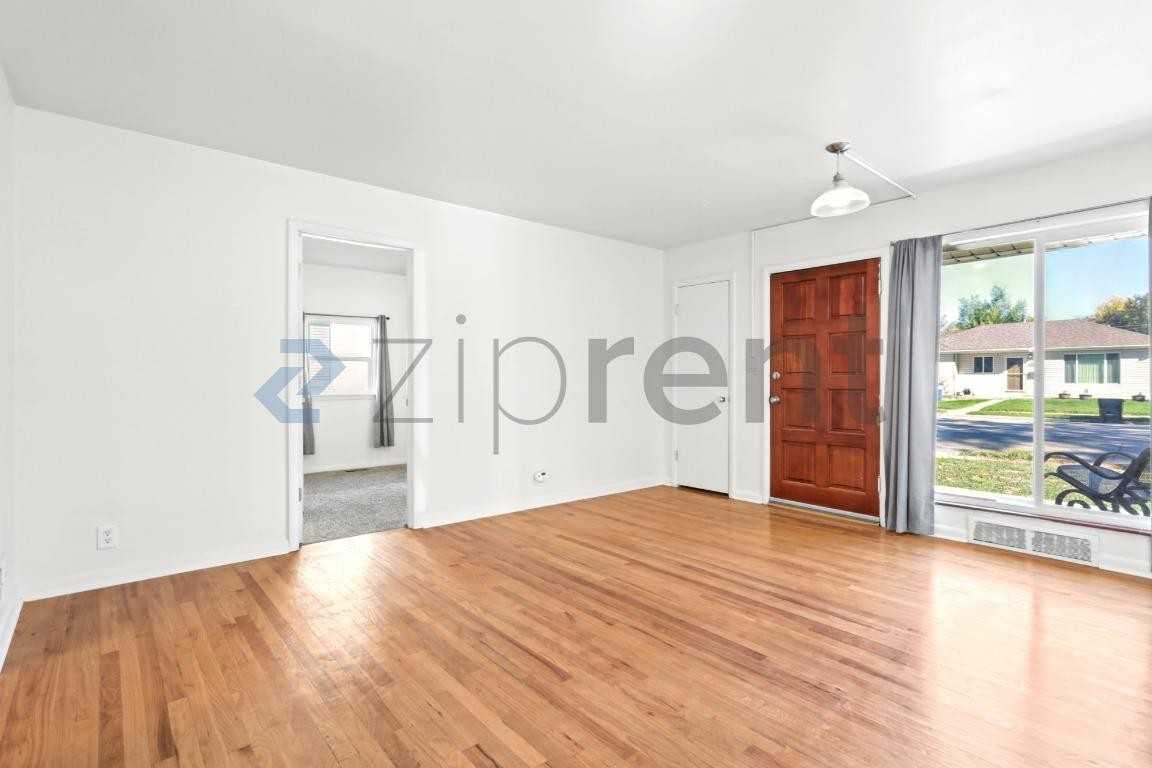 4745 S Logan St - Photo 2 of 26