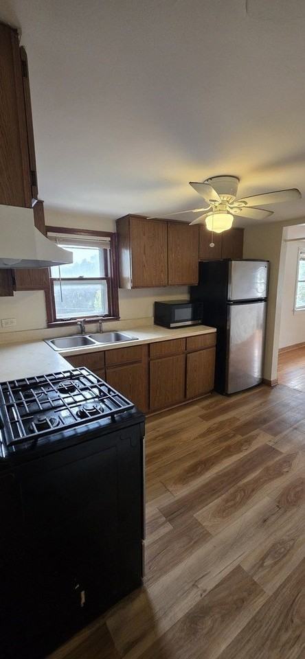 3301 N Ozanam Ave #2 - Photo 3 of 11