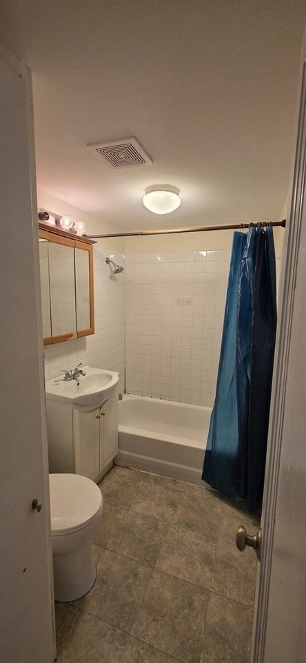 3301 N Ozanam Ave #2 - Photo 7 of 11