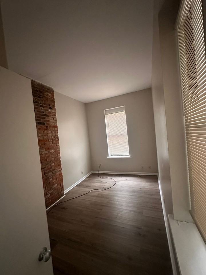 Menard Apartments - Photo 2 of 16
