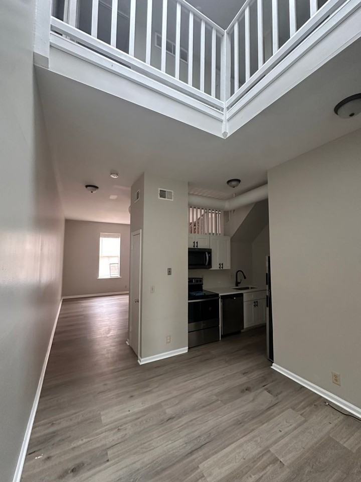 Menard Apartments - Photo 4 of 16