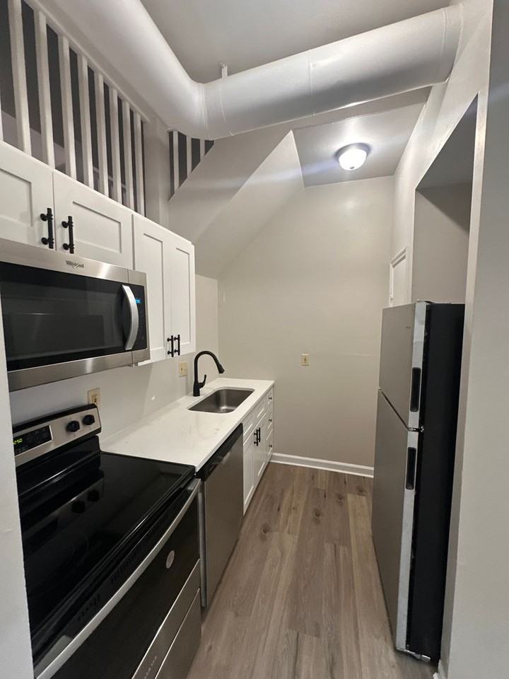 Menard Apartments - Photo 6 of 16