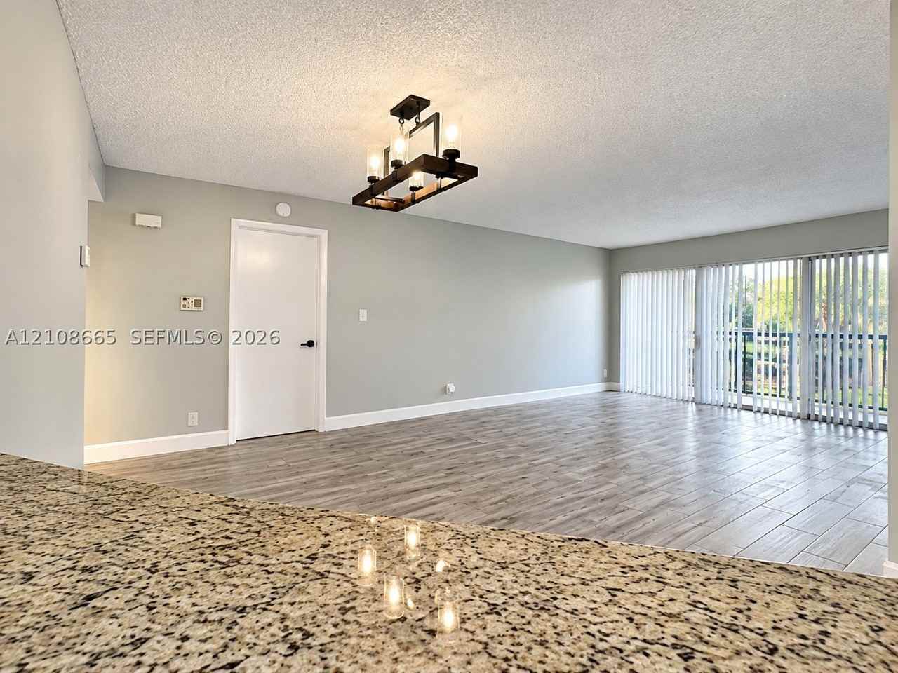 8955 Wiles Rd #204 - Photo 4 of 14