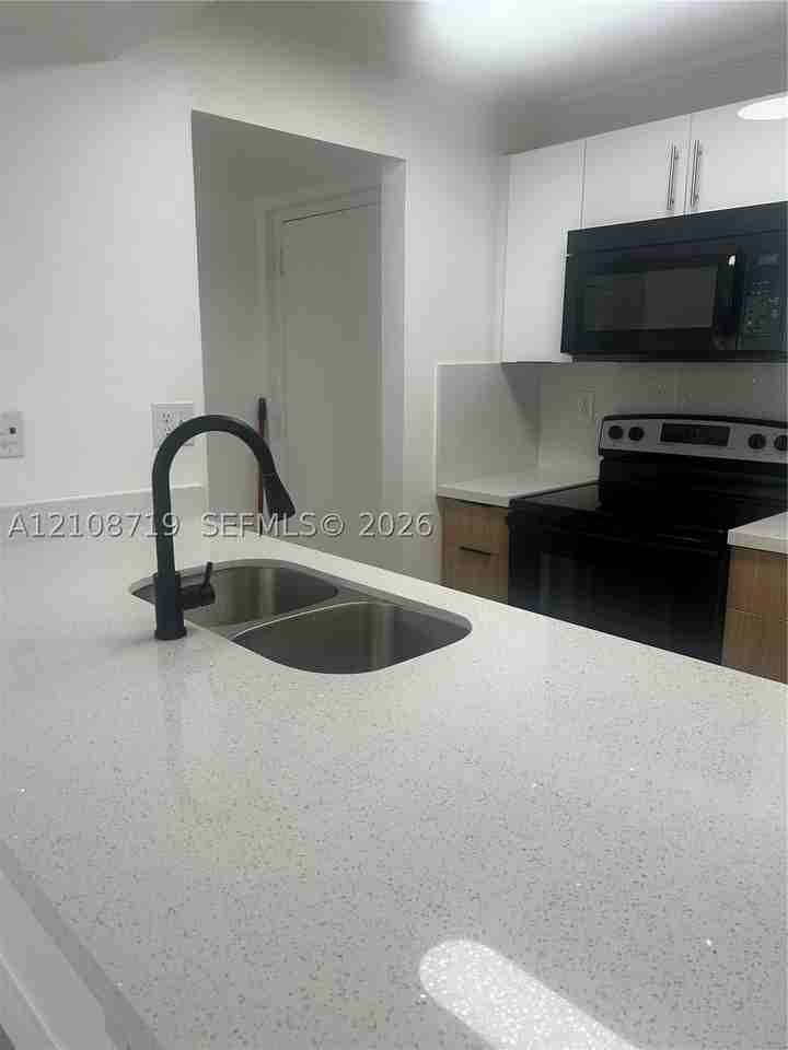 7035 Nw 186th St #D309 - Photo 4 of 16