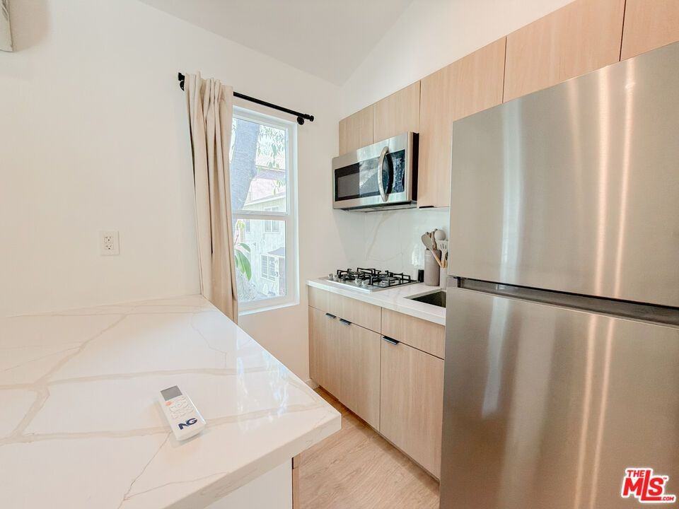 6138 Carlos Ave ##1/2 - Photo 5 of 18