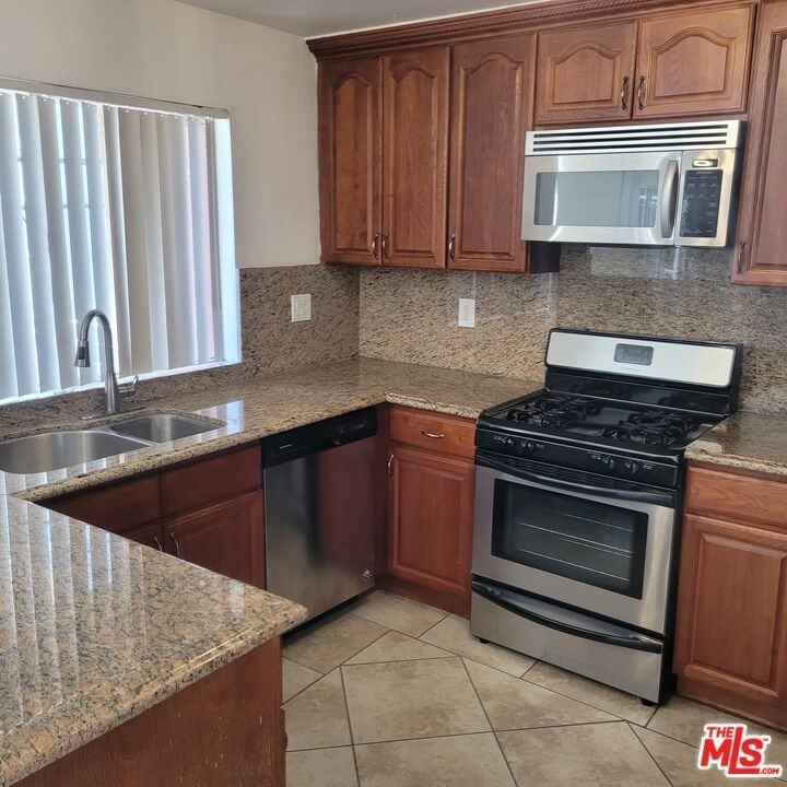 1200 S Shenandoah St ##105 - Photo 3 of 17