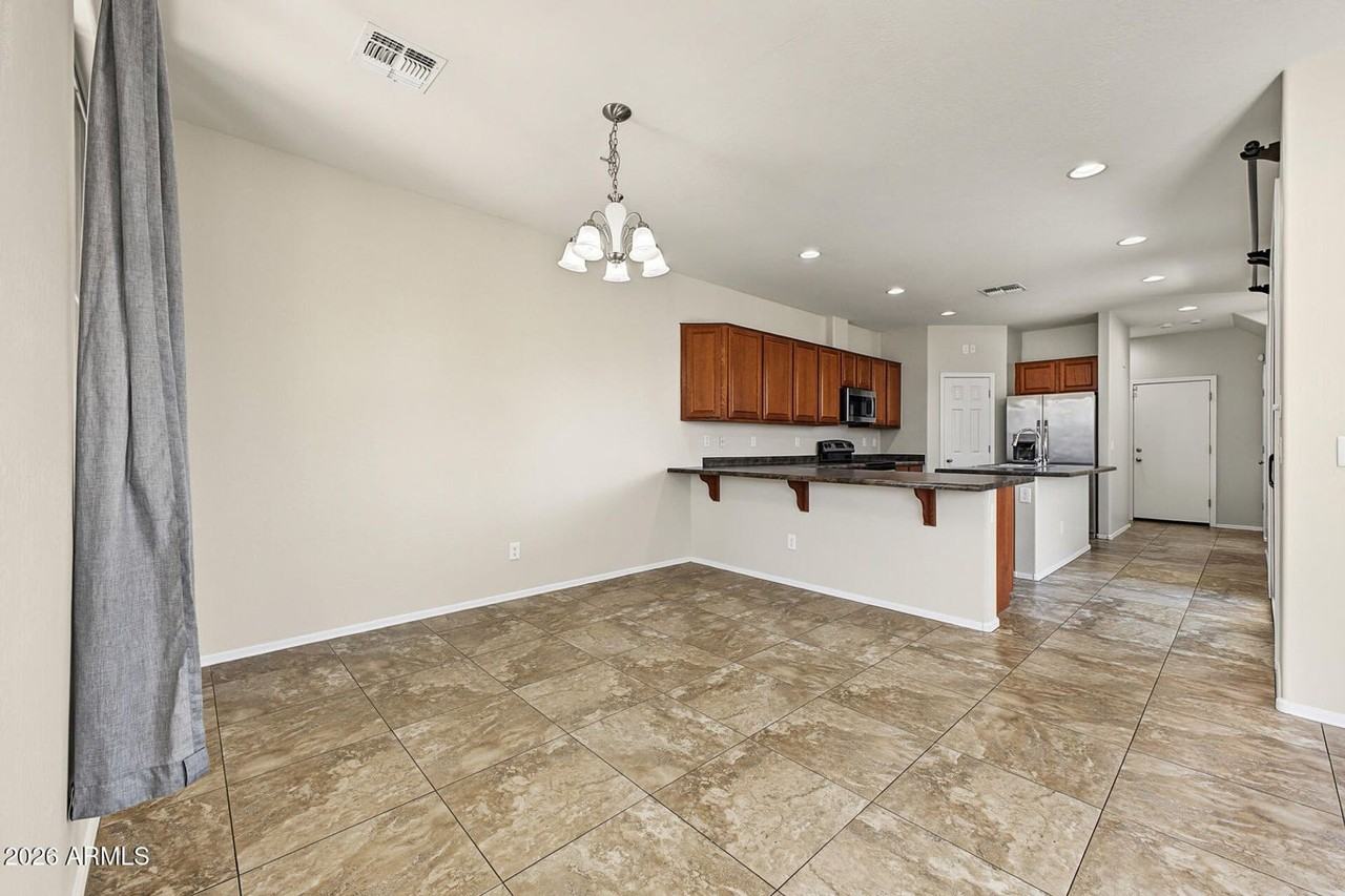 8952 W Nicolet Ave - Photo 5 of 24