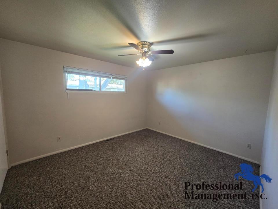 823 Avenue C - Photo 4 of 7