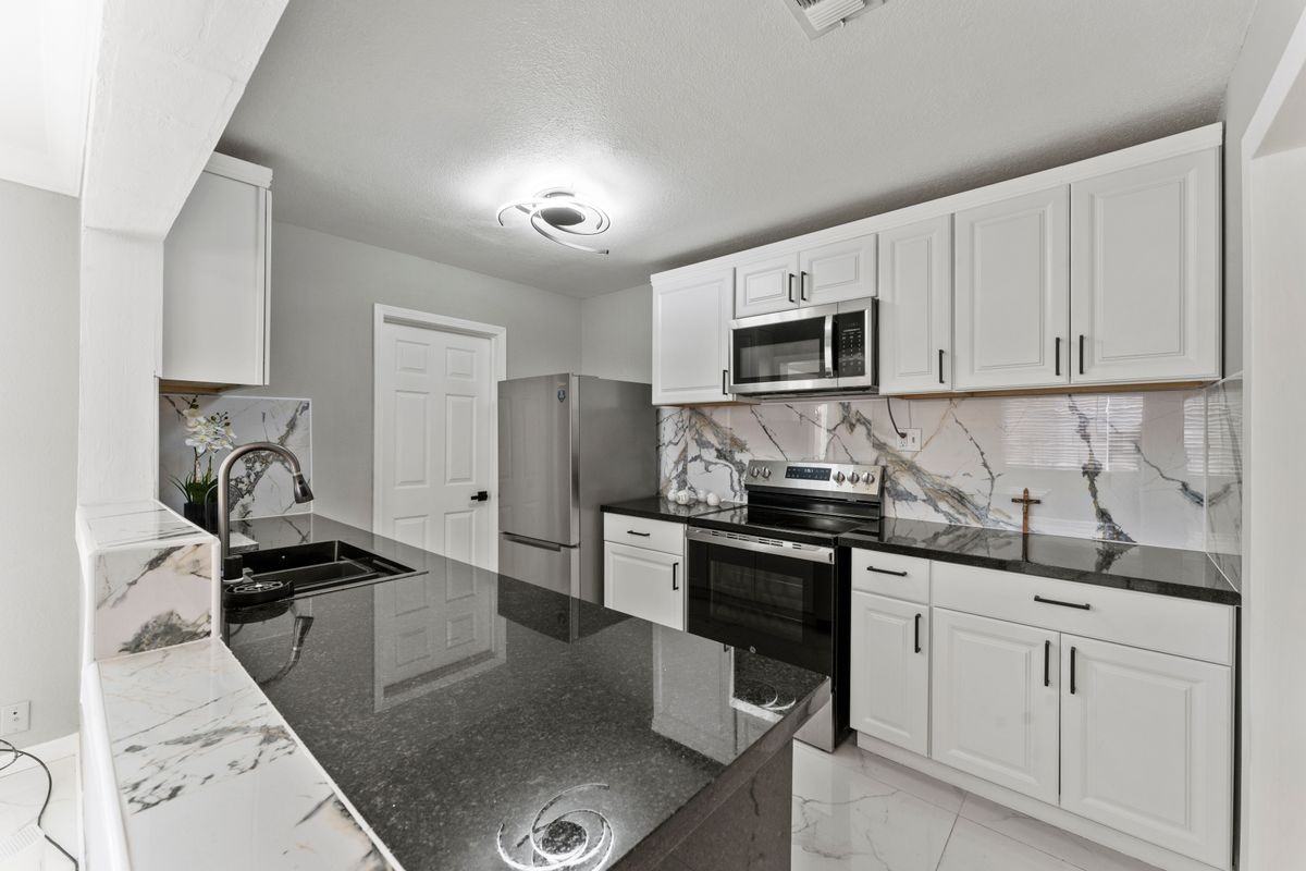 9906 Aries Way - Photo 6 of 32