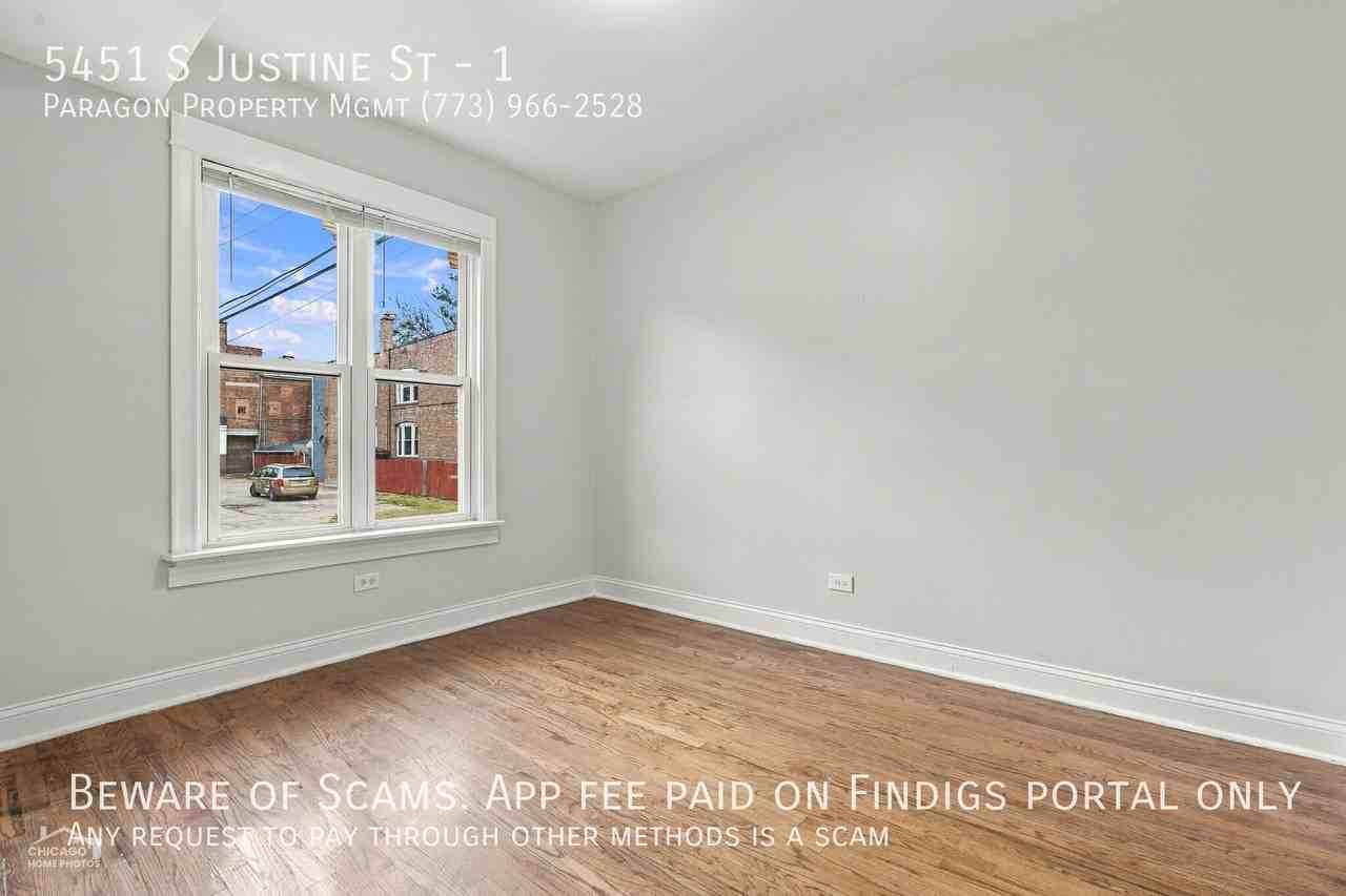5451 S Justine St #1 - Photo 3 of 13