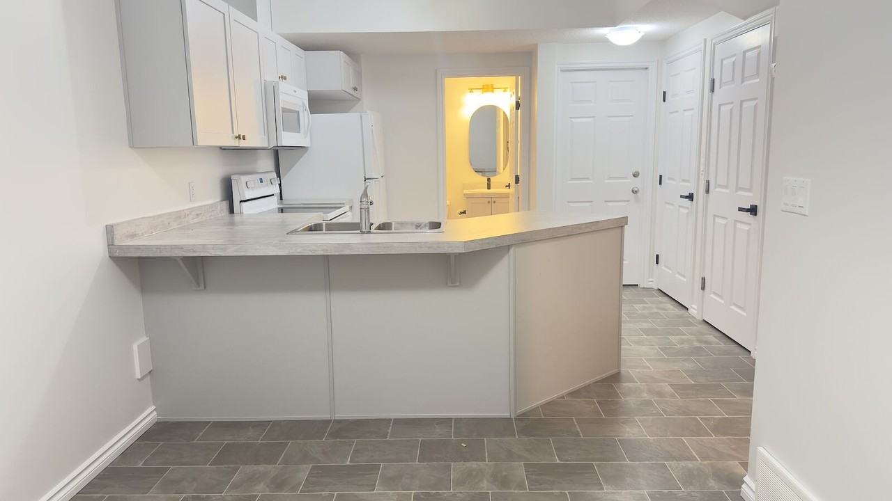1409 Erker Cres Nw - Photo 7 of 8