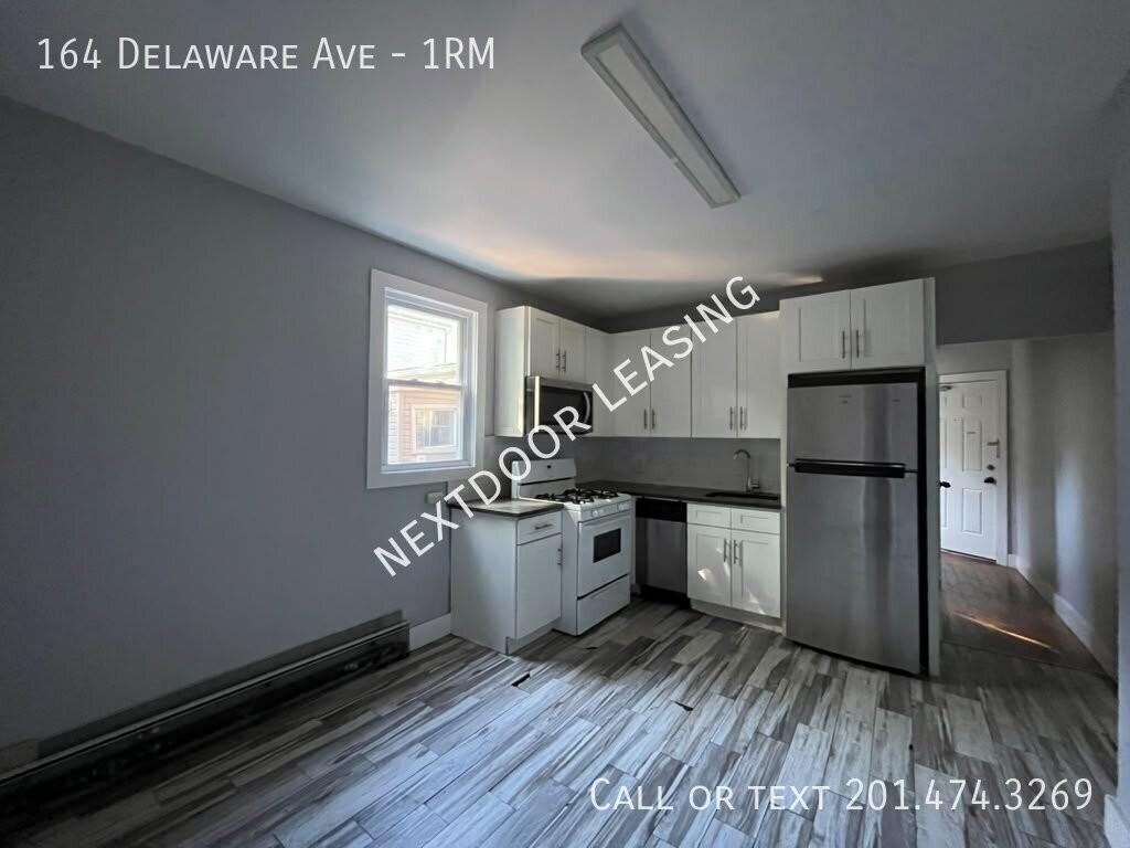 164 Delaware Ave #1RM - Photo 2 of 10