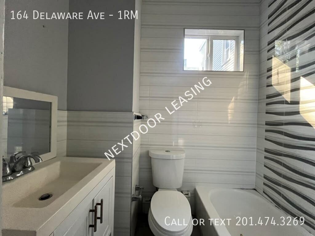 164 Delaware Ave #1RM - Photo 3 of 10