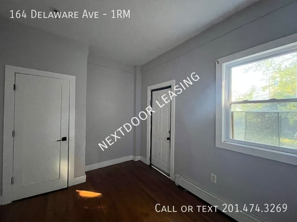 164 Delaware Ave #1RM - Photo 5 of 10