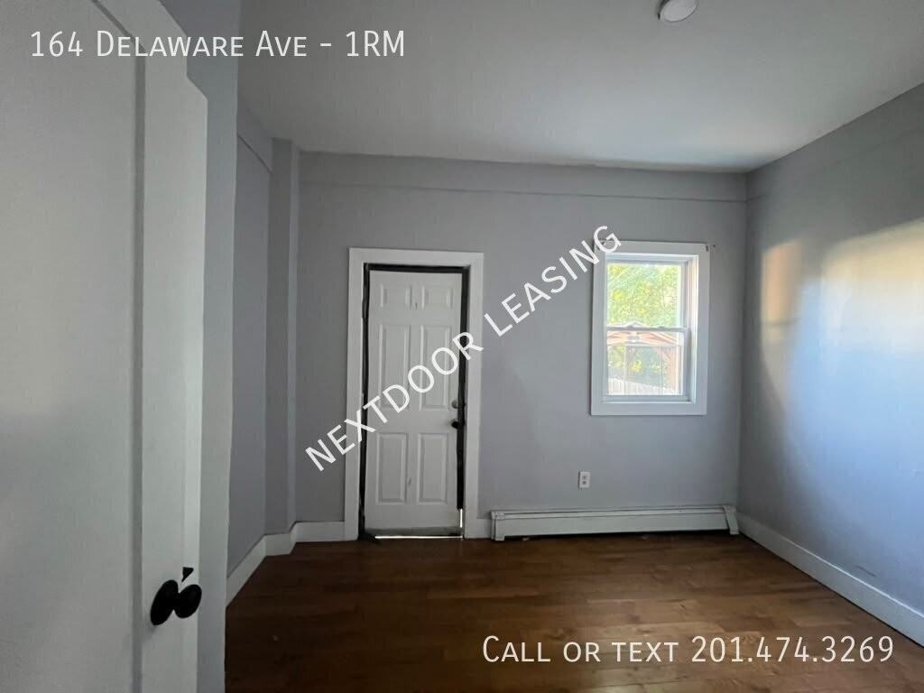 164 Delaware Ave #1RM - Photo 6 of 10