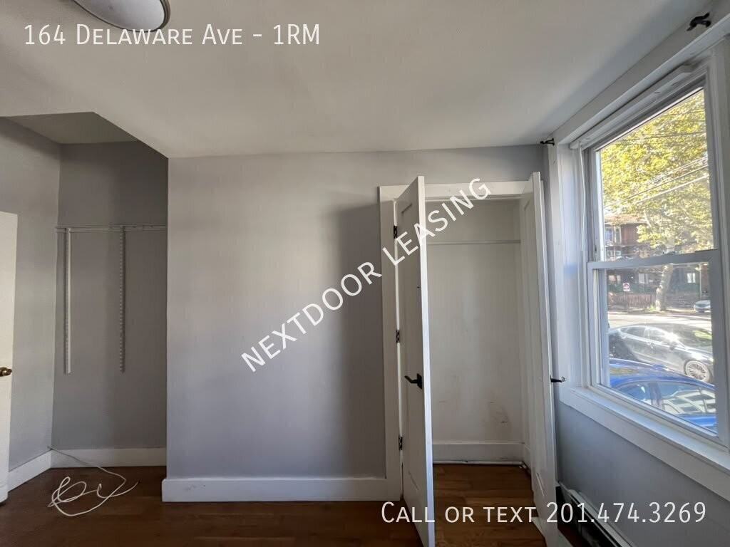 164 Delaware Ave #1RM - Photo 7 of 10