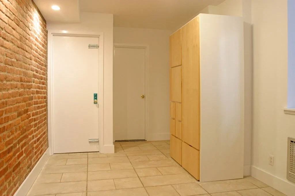 E 90th St - Photo 2 of 8