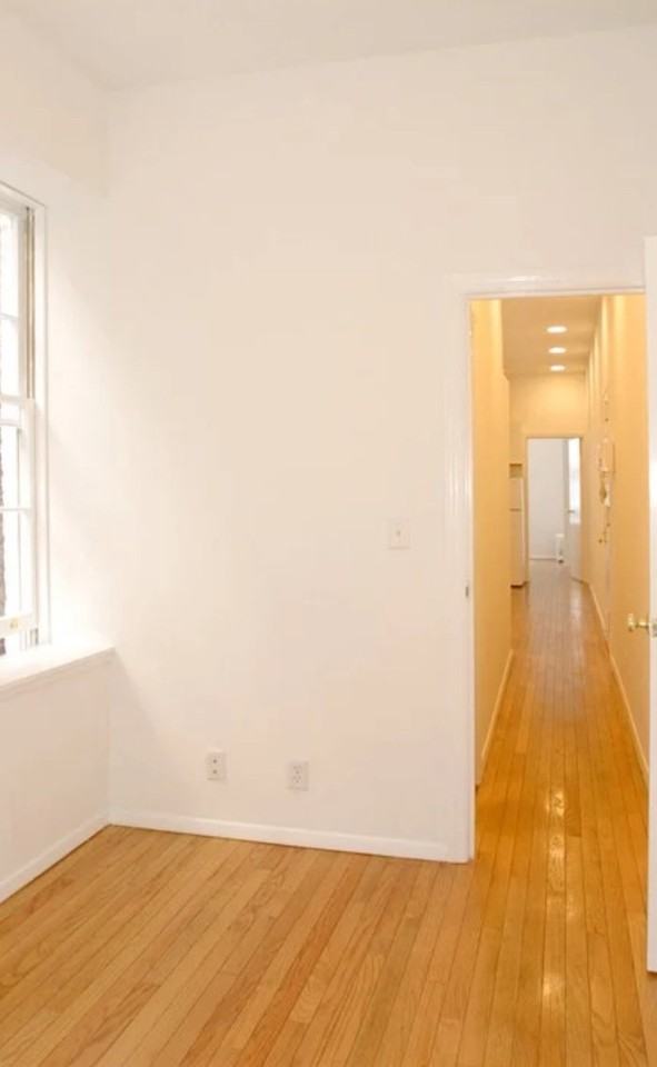 E 90th St - Photo 4 of 8