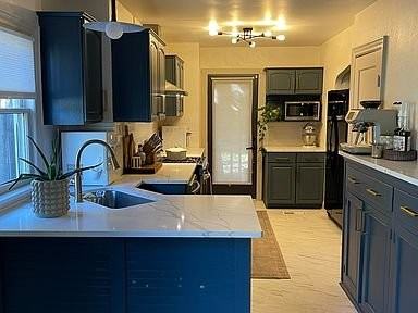 419 E 70th Ter - Photo 6 of 12