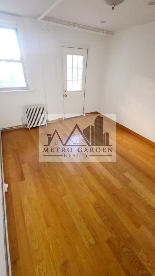 64-07 102nd Street - Photo 7 of 9