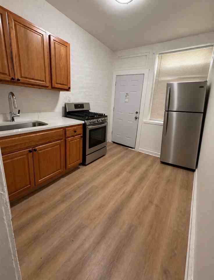 119-21 E 59th St - Photo 2 of 5