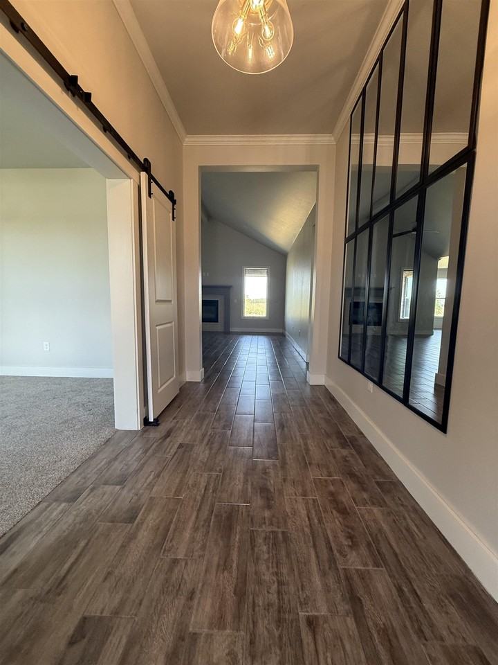 7009 Chisholm Ranch Dr - Photo 6 of 36