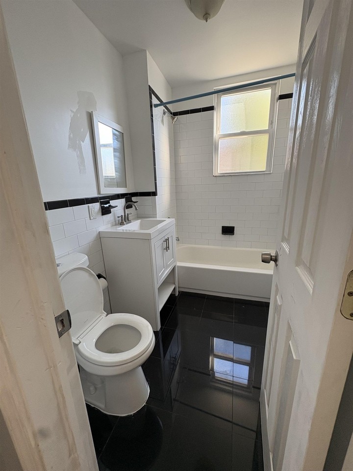 305 Cator Ave #1R - Photo 6 of 12