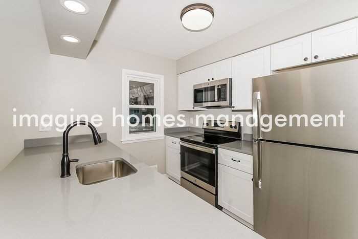 10640 Wren St Nw - Photo 6 of 20