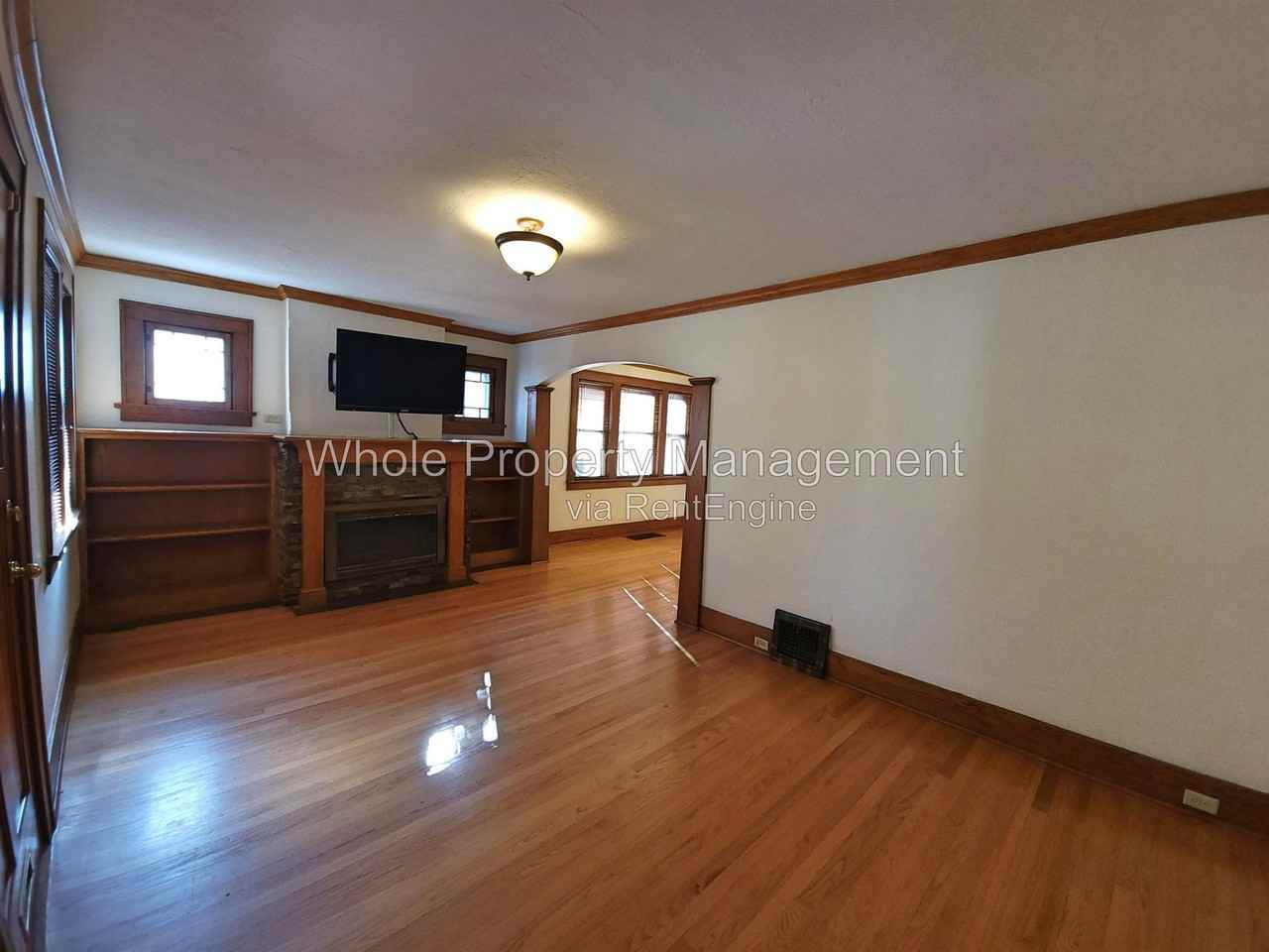 687 S Ogden St - Photo 3 of 24