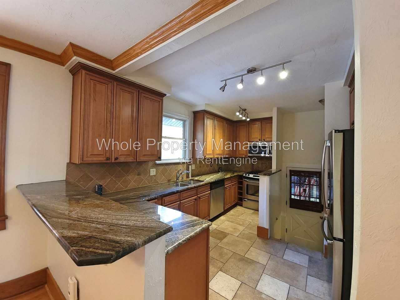 687 S Ogden St - Photo 7 of 24