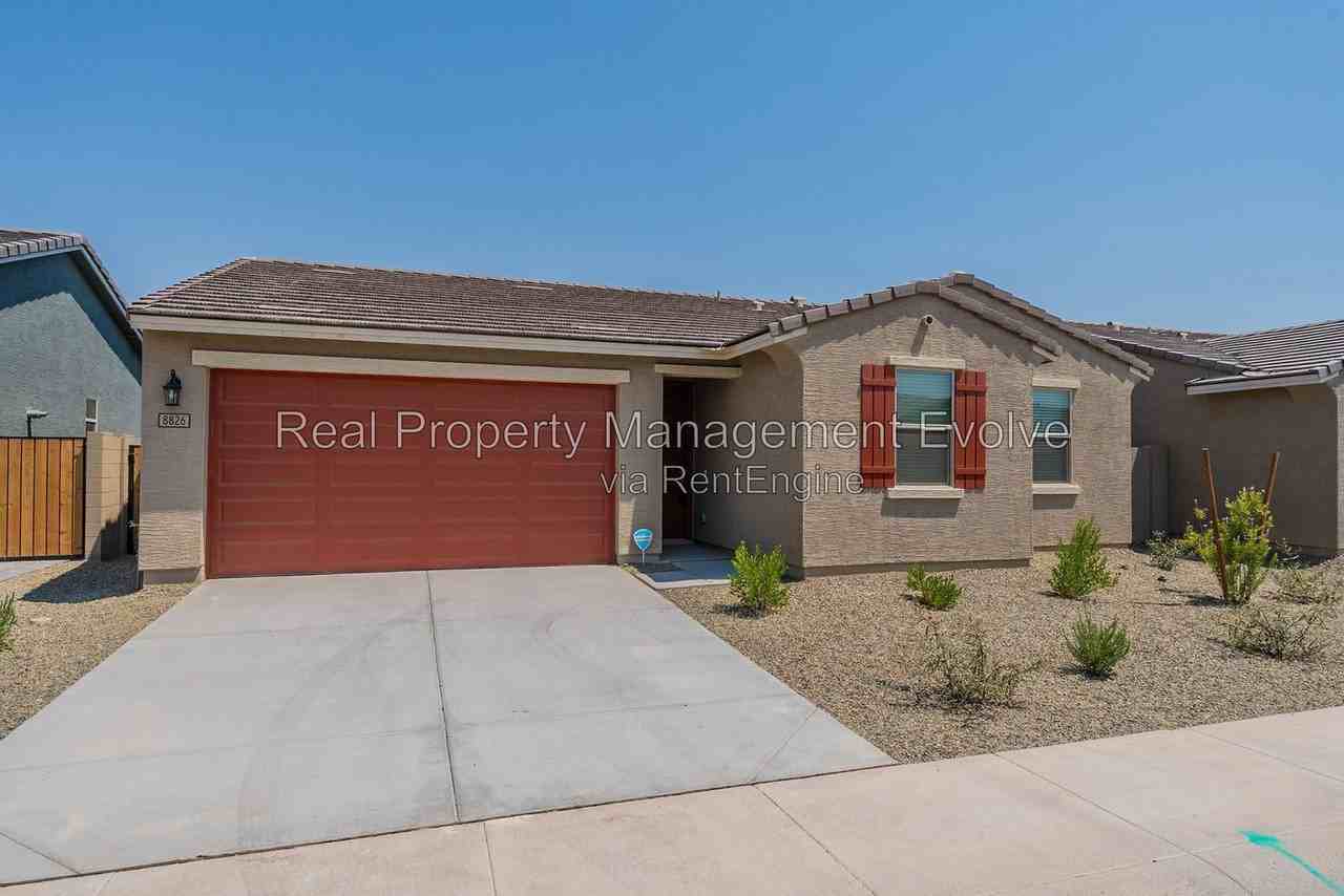 8826 W Odeum Ln - Photo 2 of 50