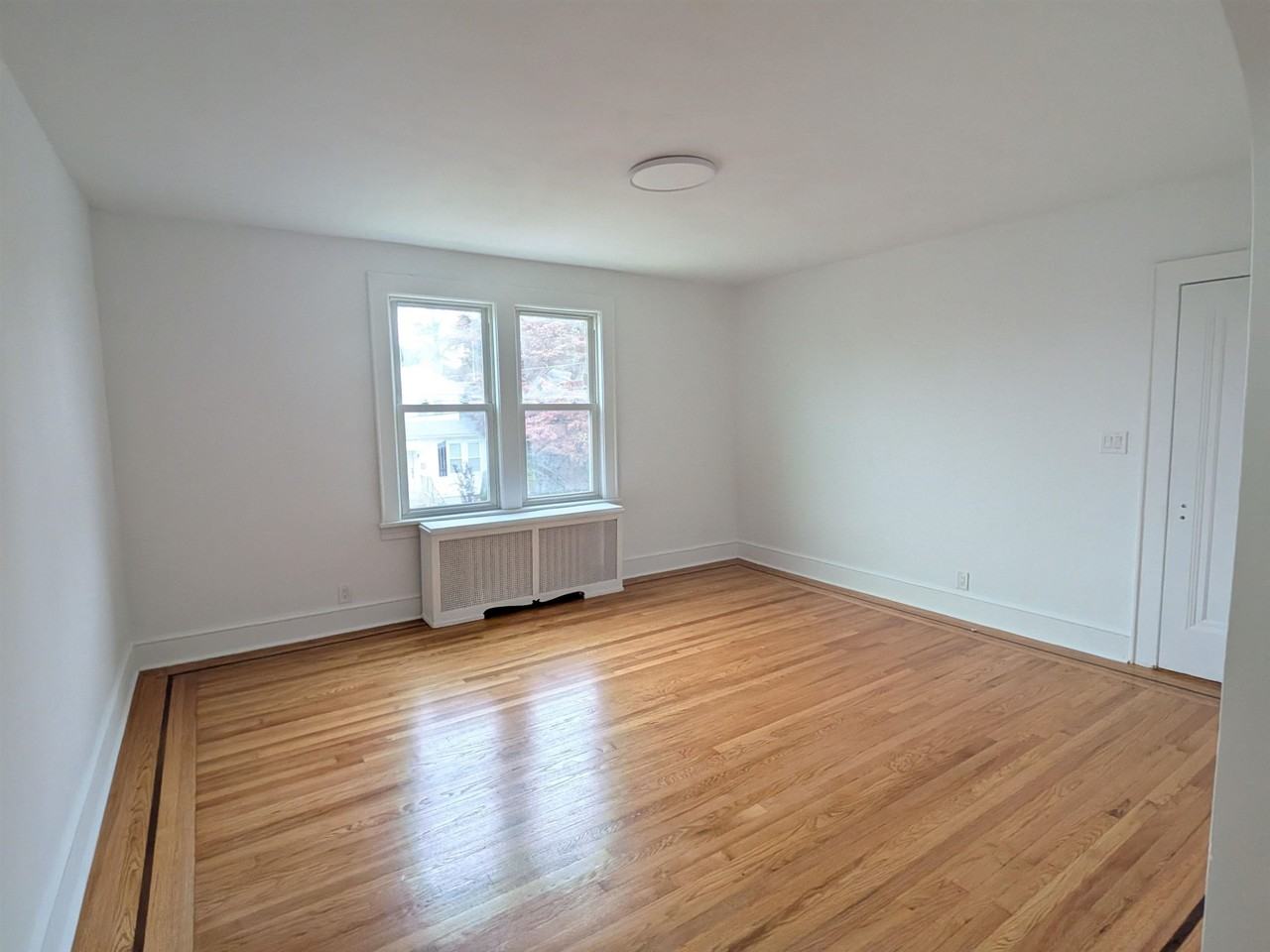 313 E 23rd St #2 - Photo 3 of 8