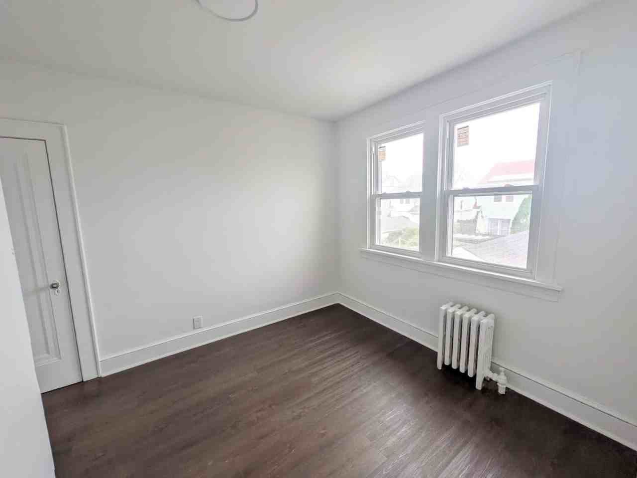 313 E 23rd St #2 - Photo 5 of 8