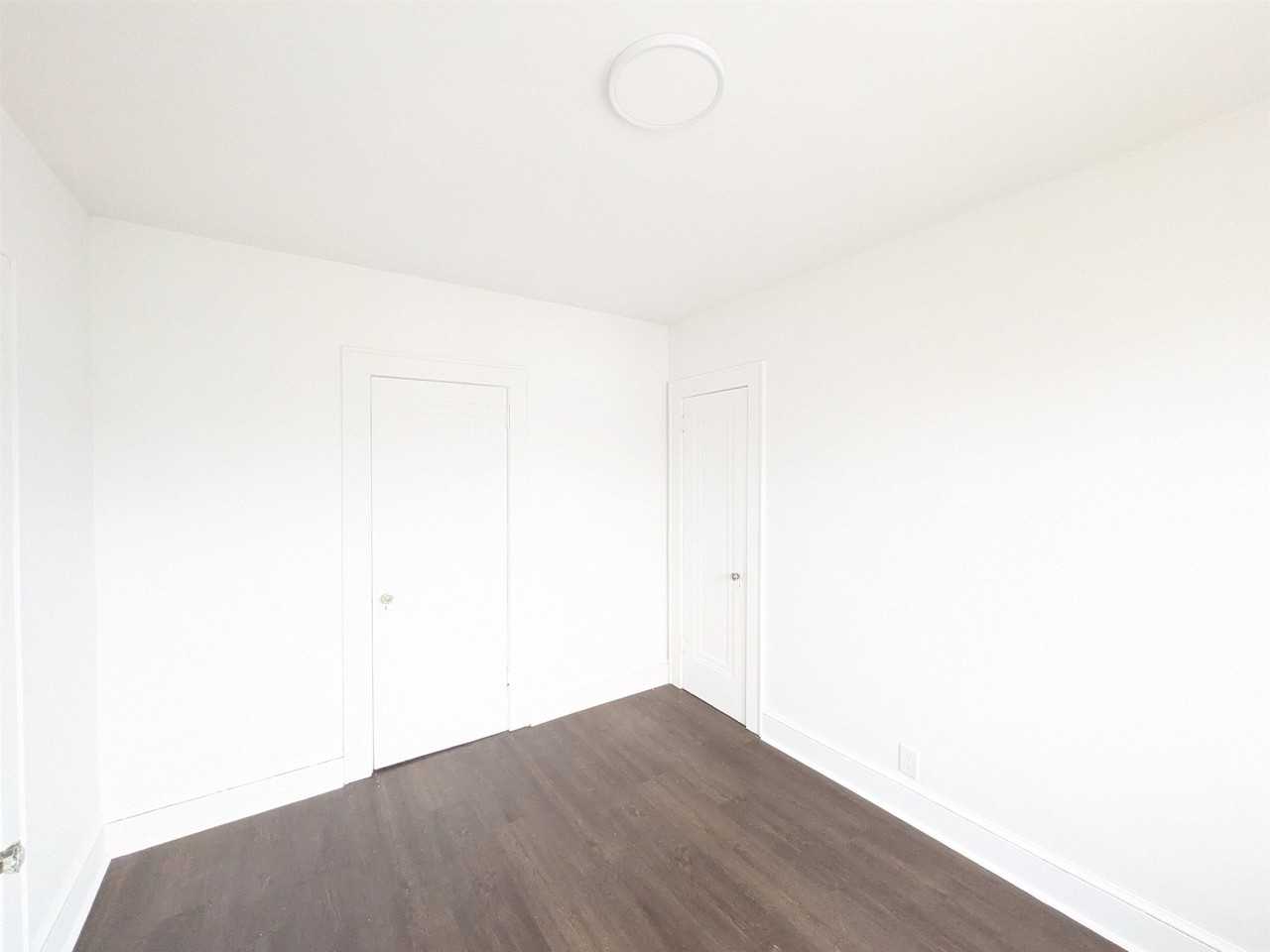 313 E 23rd St #2 - Photo 6 of 8
