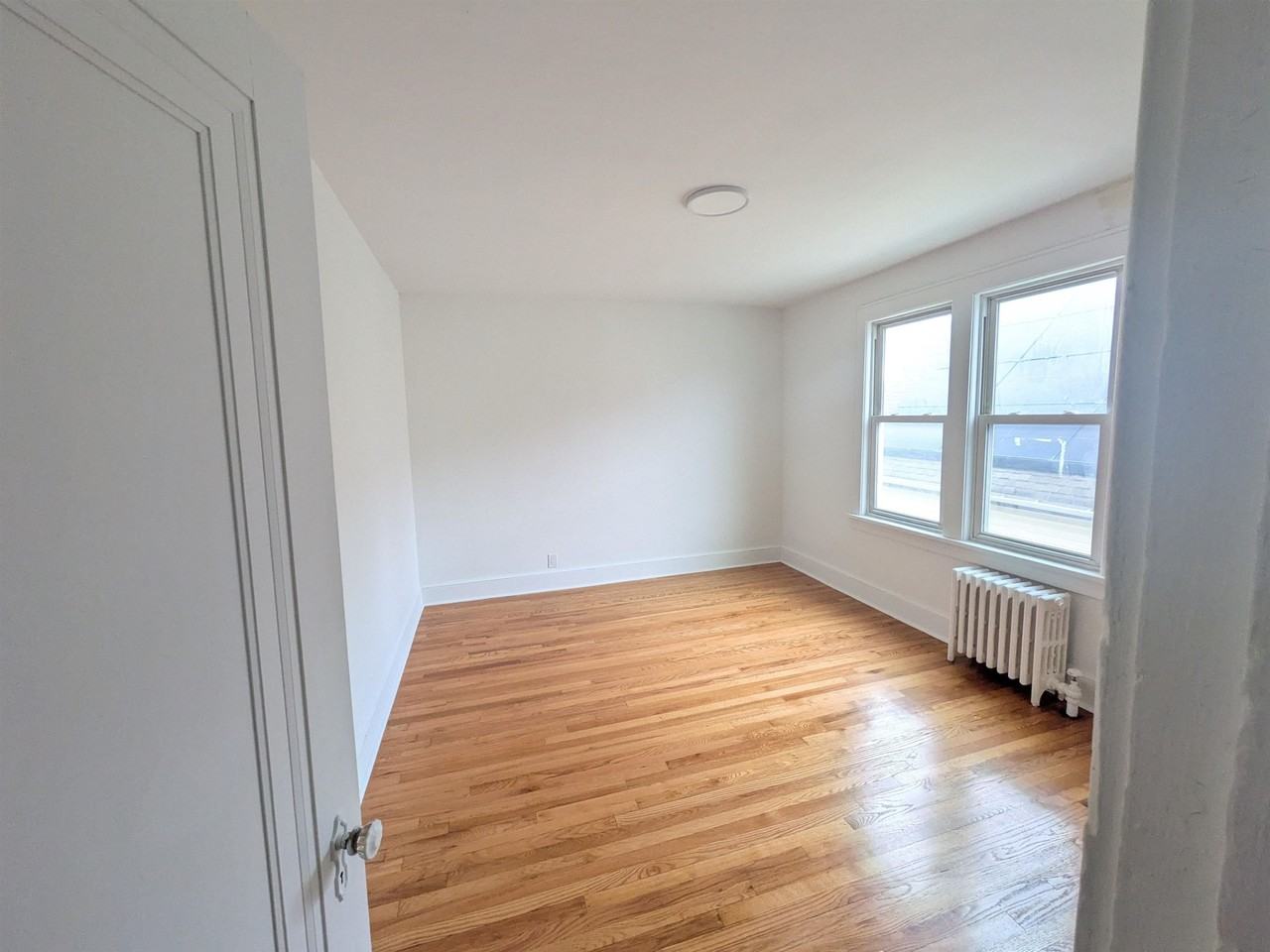 313 E 23rd St #2 - Photo 7 of 8