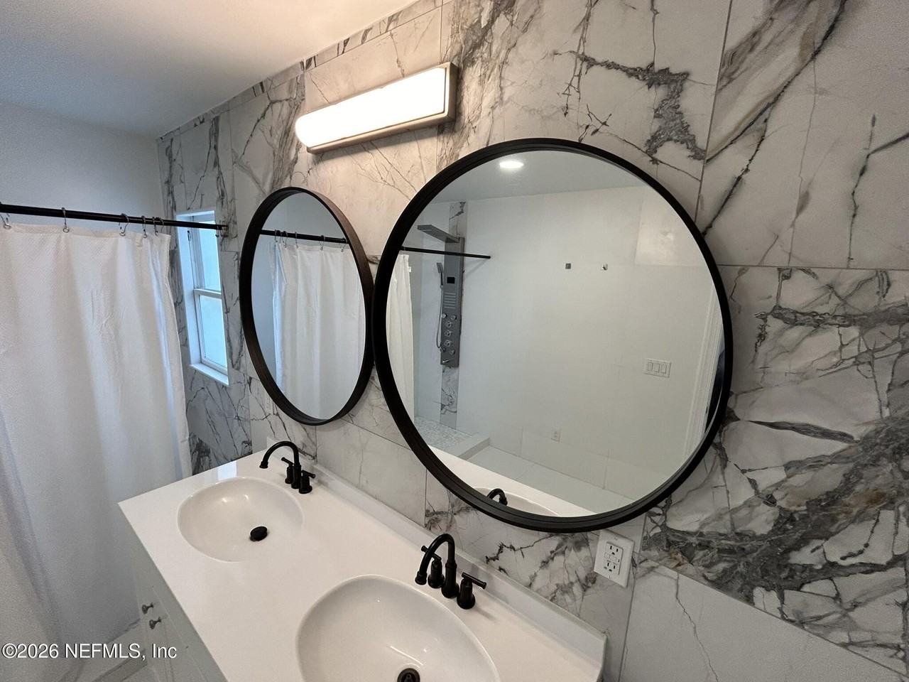 215 E 3rd St - Photo 6 of 37