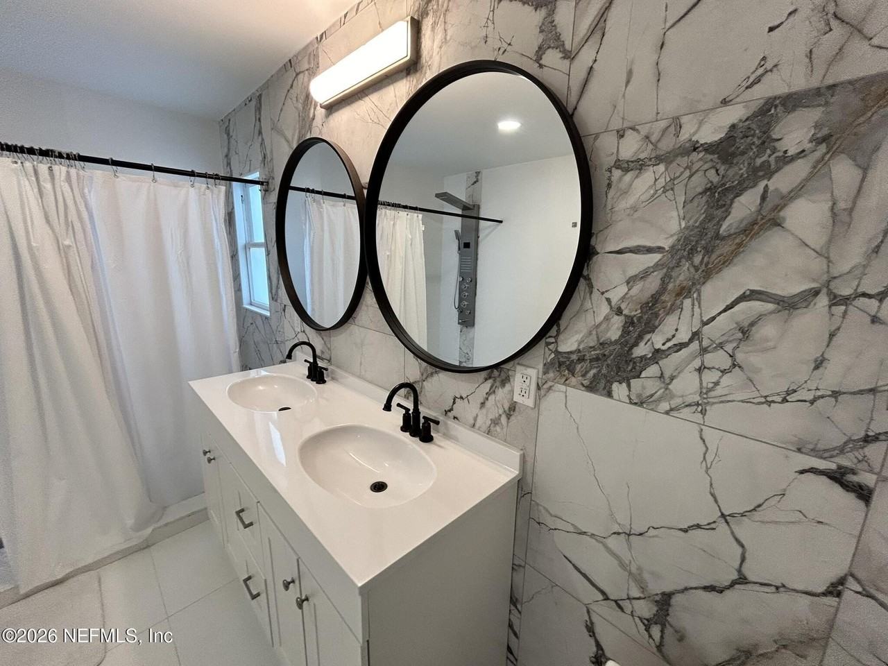 215 E 3rd St - Photo 7 of 37