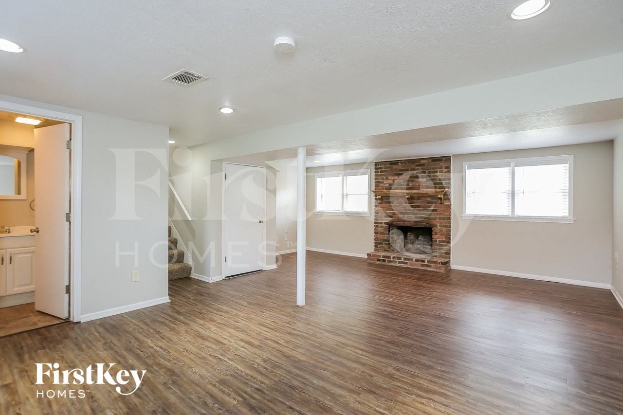 10606 W 71st Pl - Photo 3 of 15