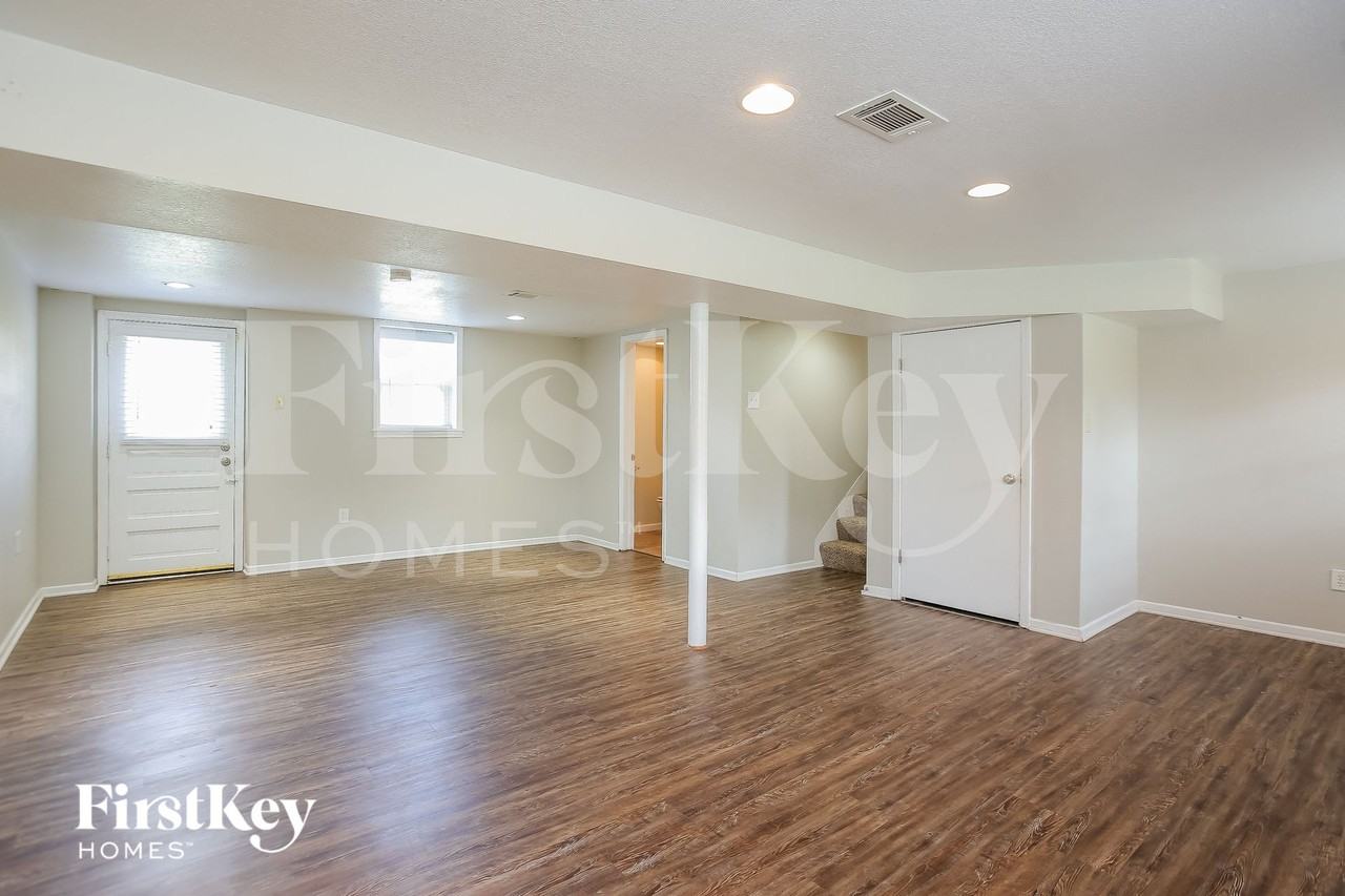 10606 W 71st Pl - Photo 4 of 15