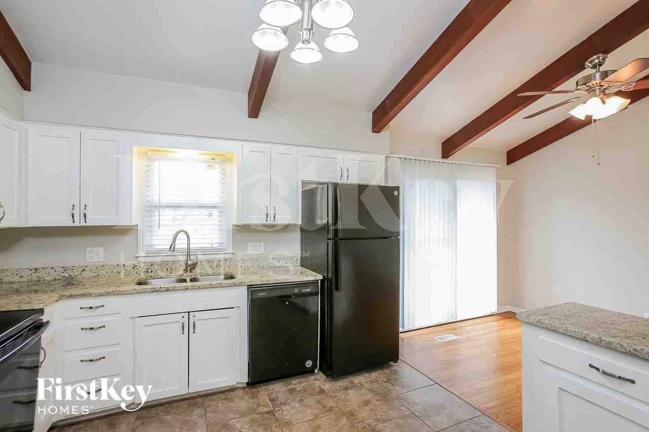 10606 W 71st Pl - Photo 5 of 15