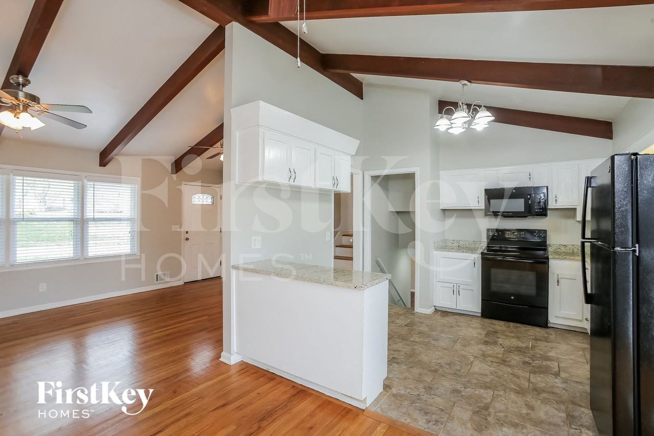 10606 W 71st Pl - Photo 6 of 15
