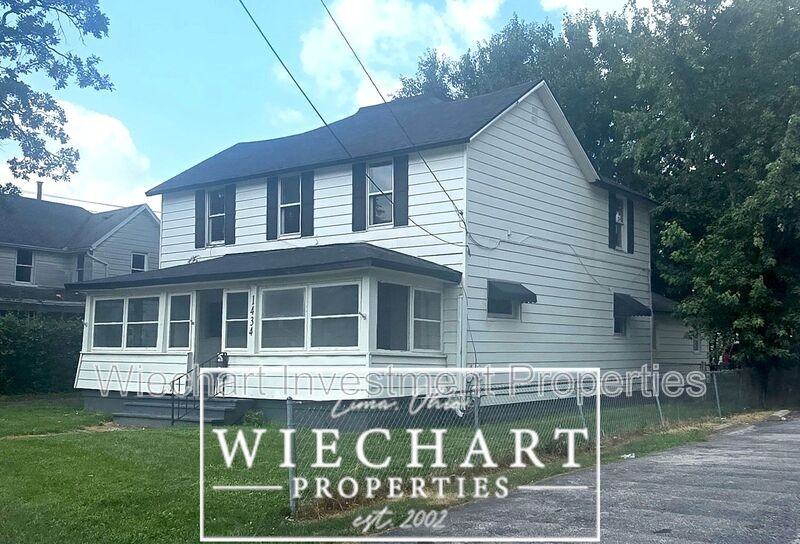 1434 Oakland Pkwy - Photo 2 of 15