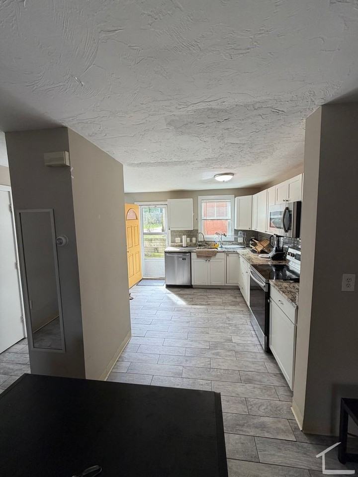 1447 Tremont St - Photo 4 of 5