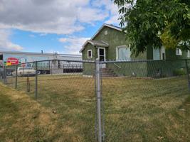 featured image of 104 N M St