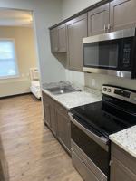 featured image of 302 W 9th St