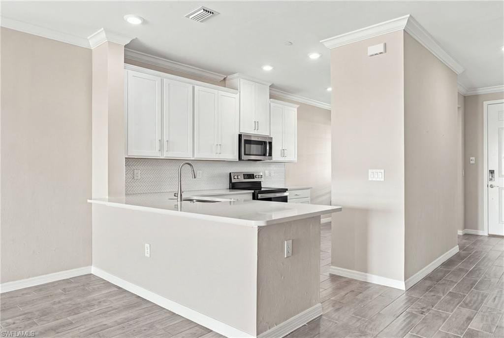 11841 Venetian Lagoon Dr #103 - Photo 5 of 40