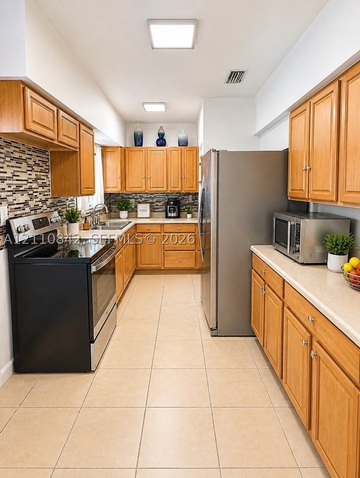 15111 Nw 32nd Ave #0 - Photo 4 of 11