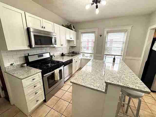 24 Teele Ave #1 - Photo 4 of 13