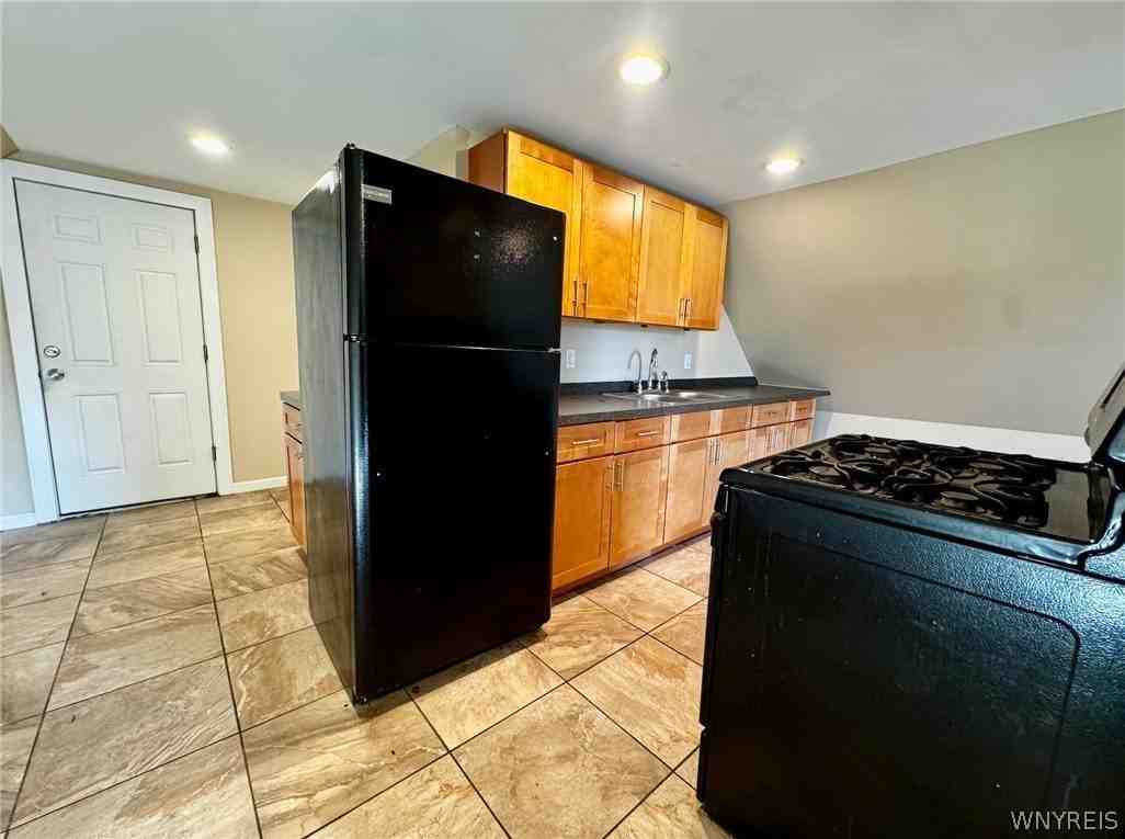 114 Cable St - Photo 3 of 7