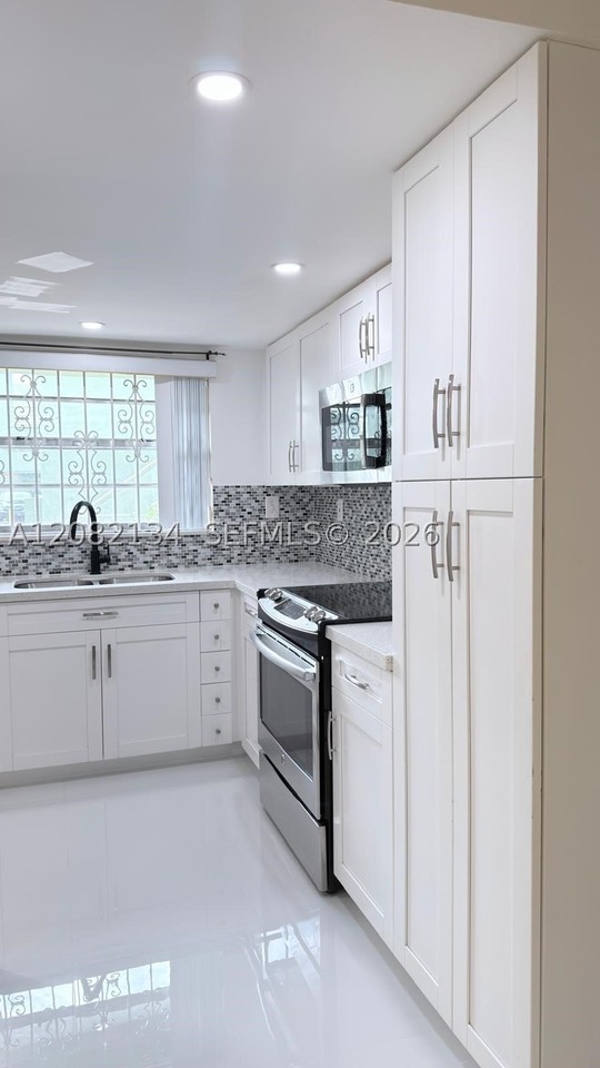 11183 Nw 7th St #104 - Photo 2 of 30